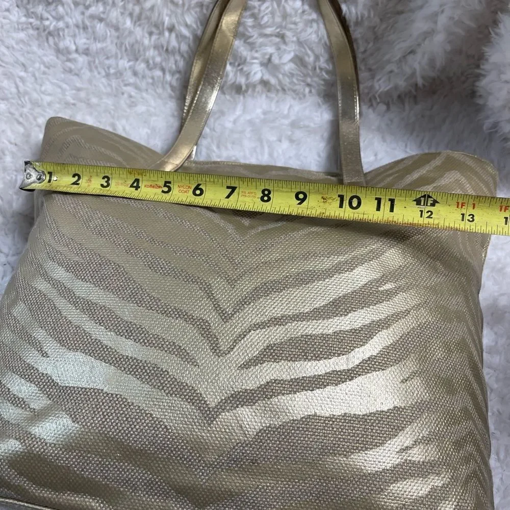 Michael Kors Metallic gold zebra print large tote gold tone hardwares and straps